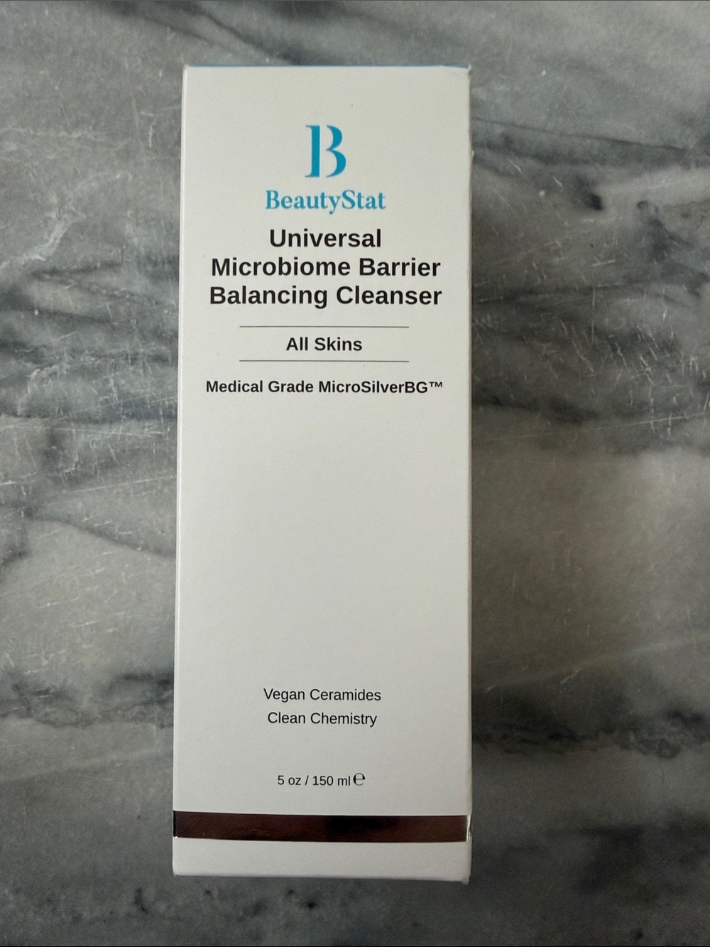 BeautyStat Cleanser in White with Teal Logo
